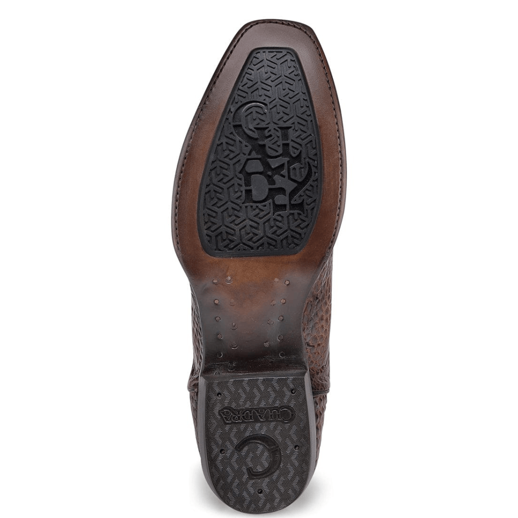 Suela completa negra con grabado y textura antiderrapante.