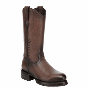 Bota alta de hombre color miel en piel texturizada, diseño clásico.