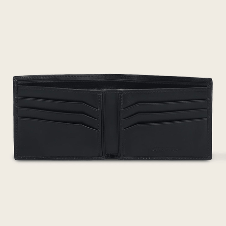 Vista interior de compartimentos con acabado en piel lisa.