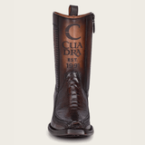 Vista frontal del tubo con grabado decorativo.