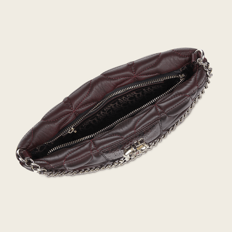 Interior del bolso con cierre central y compartimentos organizadores.