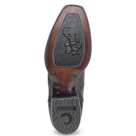 Suela completa negra con grabado y textura antiderrapante.