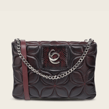 Bolso de hombro en piel con capitonado en patrones orgánicos.